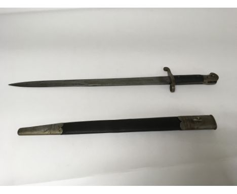 A large and unusual bayonet with Wilkinson sword markings to the blade, stamped for the reign of Queen Victoria in 1889.