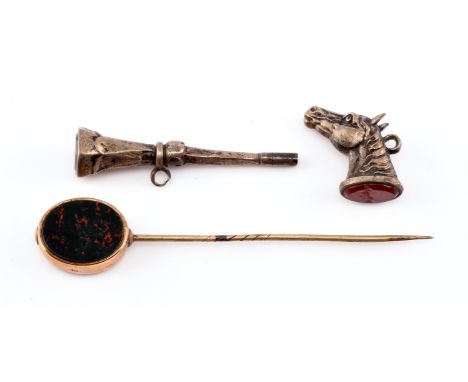 Stick pin blood stone and carnelian plaques border tested as 9 ct pin gilt metal, a silver pocket watch key with blood stone 
