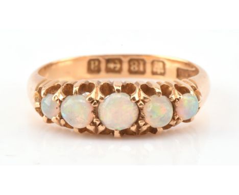 Early 20th opal cabochon five stone ring, mounted in 18 ct, hallmarked Birmingham 1900, ring size L Condition Report:  weight