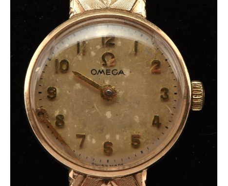 Omega a ladies gold wristwatch, the signed dial with Arabic numeral hour markers within a minute track, fitted with manual wi