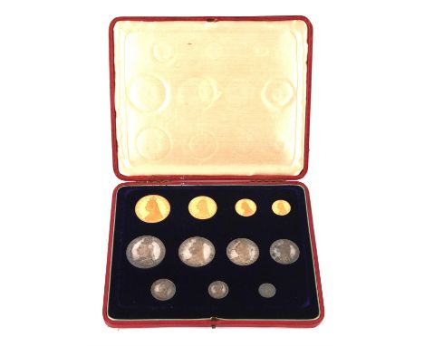 A complete and original British Royal Mint proof set 1887 in near perfect condition, comprising the four gold coins, five pou