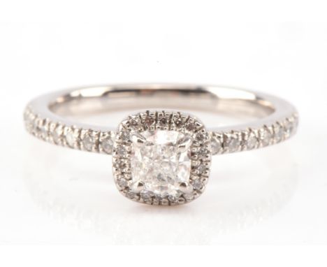 Diamond ring, with GIA certificate stating 0.50 ct central cushion cut diamond colour grade D mounted in Platinum with diamon