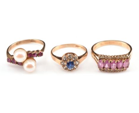 Three gem set rings, including a diamond and oval cut pink sapphire ring, size P 1/2, a blue spinel and moissanite cluster ri
