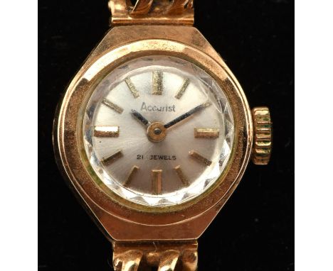 Accurist  A Ladies gold wristwatch signed dial with baton hour markers, fitted with 21 jewel manual wind movement, the case a