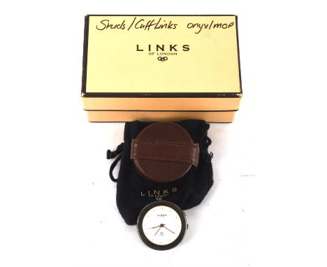 Links of London alarm clock, with fold out stand, back marked with Links of London mark, in a branded brown leather case orig