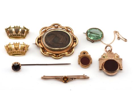 A group of six antique items, including a Victorian citrine bar brooch 9 ct, a carnelian and blood stone swivel fob framed by