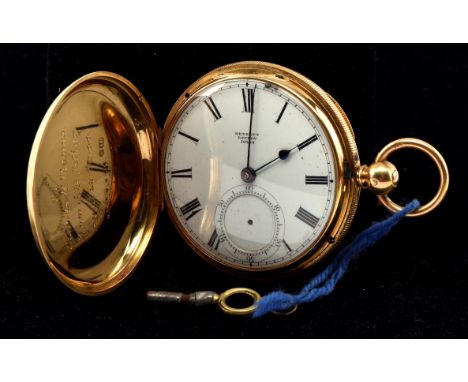 A gold full hunter pocket watch with engine turned case, the white enamel dial signed Hennet London, with black Roman numeral