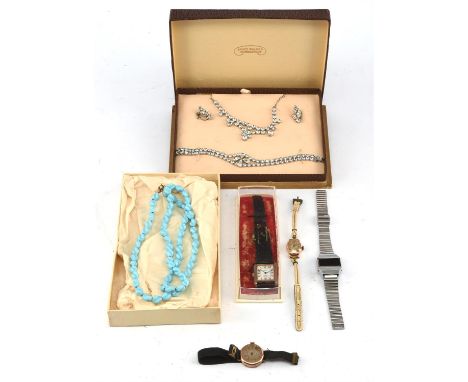 Costume jewellery set and four watches, including a 9ct gold cased ladies wrist watch with fabric strap, a Timex stainless st