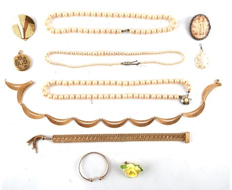 Selection of costume jewellery including child's torque bangle in 9 ct yellow gold, a bracelet, necklace, three faux pearl ne