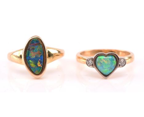 Two opal rings, a heart shaped opal set with two round brilliant cut diamonds estimated total diamond weight 0.10 carats hall