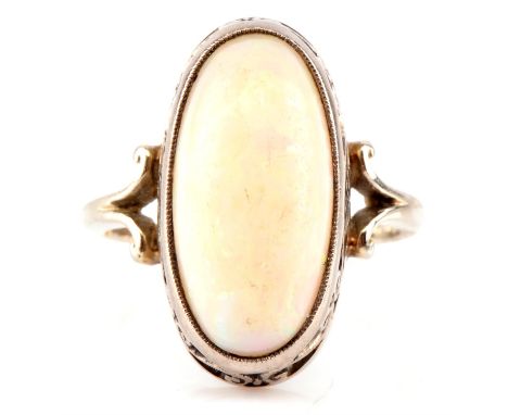 Opal ring, set with an oval cabochon cut opal 30 mm x 10 mm, in 18 ct white gold, ring size MCondition Report:  Gross weight 
