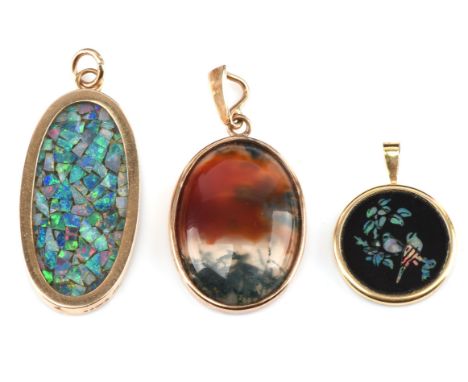 Moss agate oval cabochon pendant, an oval Onyx and opal mosaic pendant to reverse and a circular Onyx and opal dove decoratio