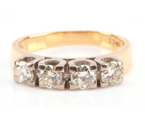 Diamond four stone ring, set with round brilliant cut diamonds with an estimated total diamond weight 0.88 carats, mounted in
