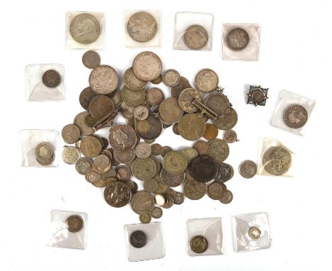 A collection of mostly British pre-1947 silver coins and medals, including a World War 1 war medal inscribed to 4991 PTE G OS