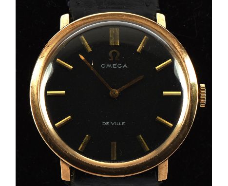 Omega A gentlemen's gold De Ville wristwatch, featuring a black dial with baton hour markers, powered by a calibre 620 17 jew