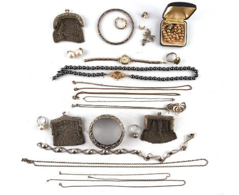 A group of silver and costume jewellery including a bangle, two purses, two rings, a pendant and chain, three chains and a ne