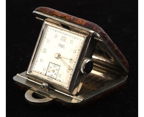 Ebel Purse watch, in a rectangular chrome plated metal and crocodile skin case, measuring 32mm x 32mm, the signed square dial