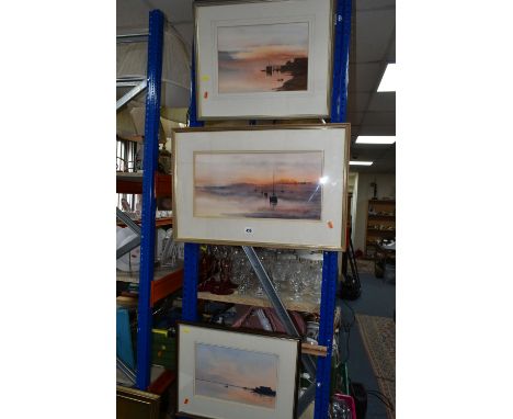 EDWARD MORRIS (BRITISH 1919-1996) THREE WELSH SUNSET WATERCOLOUR PICTURES, comprising a seascape with boats at their moorings