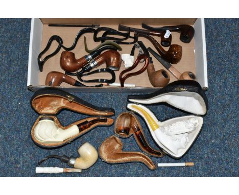 A BOX OF SMOKING ACCESSORIES TO COMPRISING MODERN MEERSCHAUM PIPES, to include a pipe with a bowl carved as a womans head wea