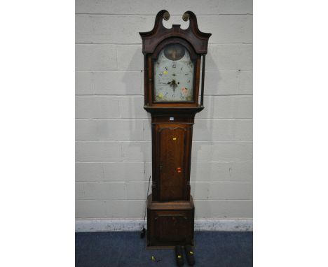 A GEORGIAN OAK EIGHT DAY LONGCASE CLOCK, with twin swan neck pediment, the arched door enclosing a 13 inch painted dial, on a