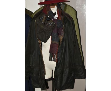 A BROWN BARBOUR CLASSIC BEAUFORT WAX JACKET WITH DETACHABLE HOOD, together with two green quilted Barbour gilets, scarf and h