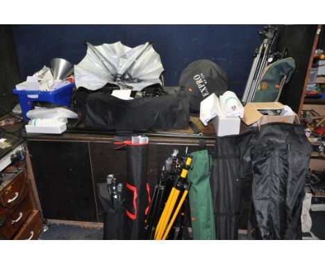 A COLLECTION OF PHOTOGRAPHIC LIGHTING EQUIPMENT including two bagged back drop frames, two stands with cross bar, a bagged se