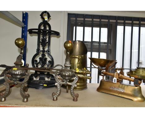 A SMALL SELECTION OF METALWARES, COMPRISING A VICTORIAN STICK STAND, the drip pan is broken, a pair of cast metal fire dogs, 
