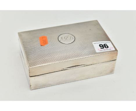 A SILVER TABLE CIGARETTE BOX, of rectangular form, engine turned pattern with engraved cartouche, wooden interior with divide