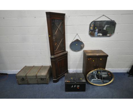 AN EARLY 20TH CENTURY OAK CASED SINGER TREADLE SEWING MACHINE, a gypsy wall mirror, an oval bevelled edge wall mirror, anothe