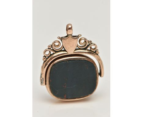 A 9CT GOLD SWIVEL FOB, of a rounded rectangular form, set with a carnelian and bloodstone inlays, rubbed 9ct hallmark, scroll