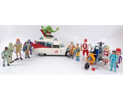 THE REAL GHOSTBUSTERS; A collection of action figures and an Ecto 1 from the Kenner line of The Real Ghostbusters. The Ecto 1