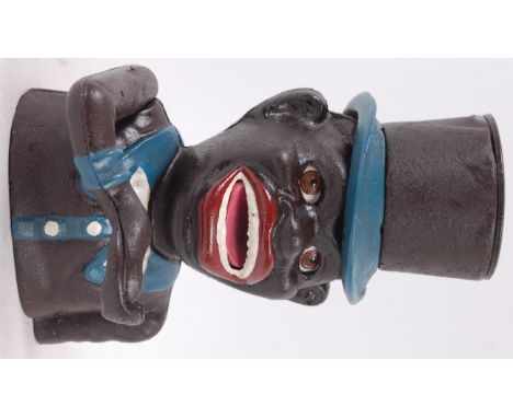 MONEY BOX; A vintage antique style cast iron novelty money box, with moving eyes and arm. Opening base.