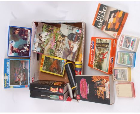 PUZZLES AND GAMES; A collection of mostly vintage jigsaw puzzles to include 3x Detecto puzzles, a collection of card games an