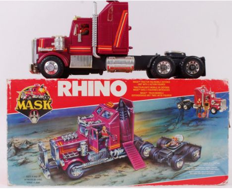 MASK; An original vintage retro Kenner MASK ' Rhino ' boxed vehicle, within the original box. With the original interior poly