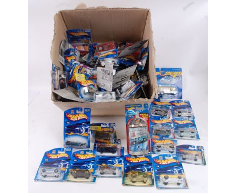 HOTWHEELS; A huge collection of assorted c2000 Mattel Hotwheels carded diecast model cars. Each unopened. 50+