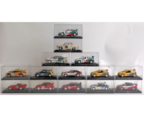 DIECAST; 14x 1:43 scale diecast model rally cars; Peugeot's, Renault, Skoda and others. Each within their original display ca