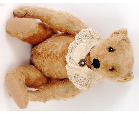 AN EARLY c1905 STEIFF TEDDY BEAR; An original early circa 1905 Steiff ' blank button ' teddy bear. 16" tall. Fully jointed ar