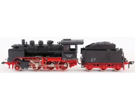 FLEISCHMANN; HO gauge 4064 railway trainset locomotive and tender in black livery, 24074 by Fleischmann. Unboxed.