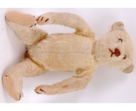 A c1950's STEIFF WHITE MOHAIR TEDDY BEAR; (blue waistcoat) An original Steiff (ear button missing) white mohair teddy bear. P