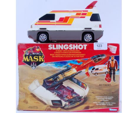 MASK; An original retro vintage Kenner MASK Slingshot toy,  with the action figure. Within the original box.
