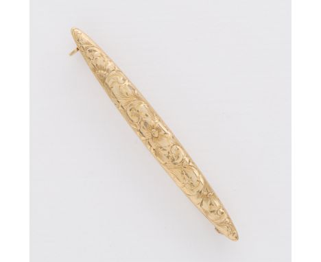 14k yellow gold bar pin of elongated form with floral detail. With locking c clasp closure. Marked 14k along the clasp.Height