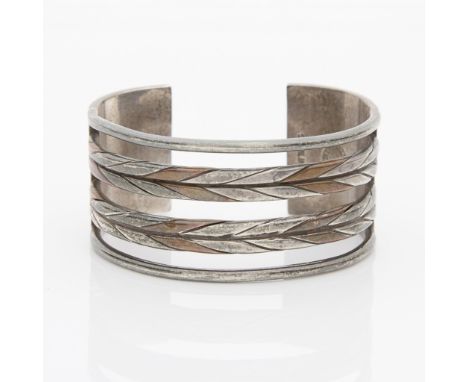 William Spratling sterling silver bracelet with two plain exterior bands, and two herringbone pattern interior bands, inlaid 