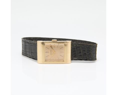 18k yellow gold Bucheron Reflet wristwatch with manual Omega movement. The watch in an 18k yellow gold rectangular case with 