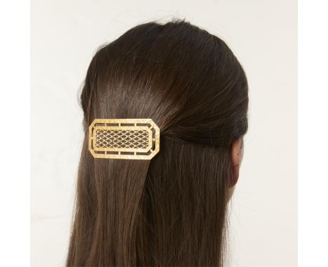 Shreve &amp; Co., San Francisco United States. 14k yellow gold barrette of rectangular form with clipped corners. The two out