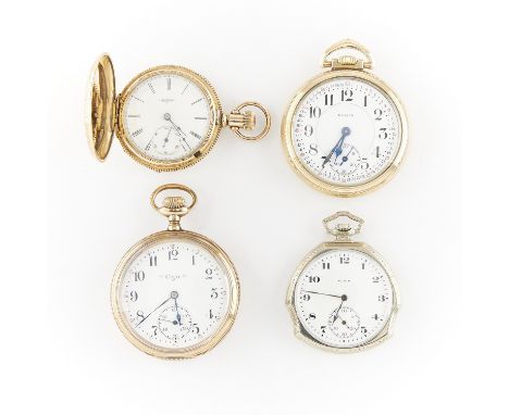 Group of four gold filled pocket watches including:One Elgin pocket watch in a 14k gold filled hunter case with flowers and b
