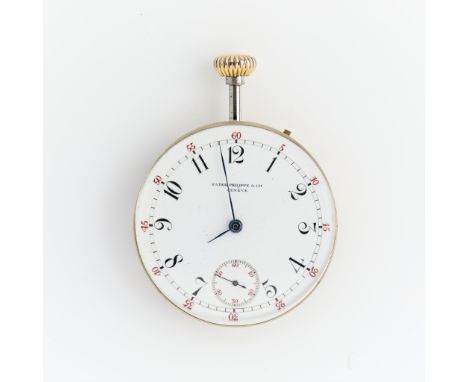 One Patek Philippe pocket watch movement, dial, and crystal. The white dial marked Patek Philippe &amp; Co. Geneve with black
