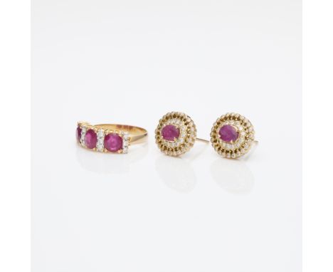 Group of two pieces yellow gold, ruby &amp; diamond jewelry. One 18k yellow gold ring set with three oval cut rubies accented