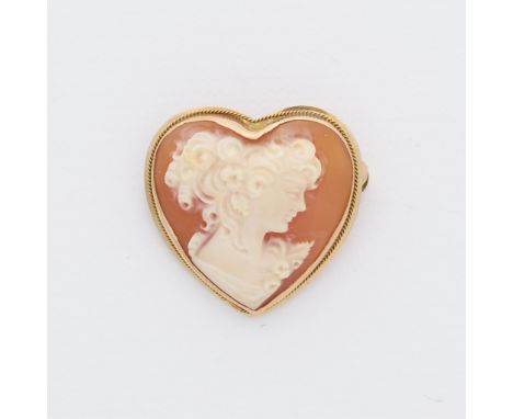 14k yellow gold heart-shaped shell cameo brooch depicting a woman in profile. With hidden bale and locking c clasp closure. M