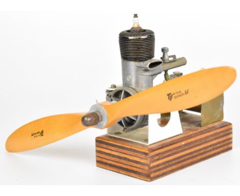 Vintage Ohlsson &amp; Rice spark ignition model aircraft petrol engine, on stand with fuel tank, overall height 16.5cm