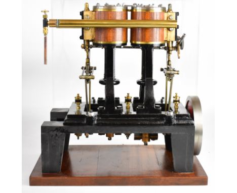 Large twin cylinder live steam engine with solid flywheel, Stephenson's link reversing gear and drip oilers to the main beari